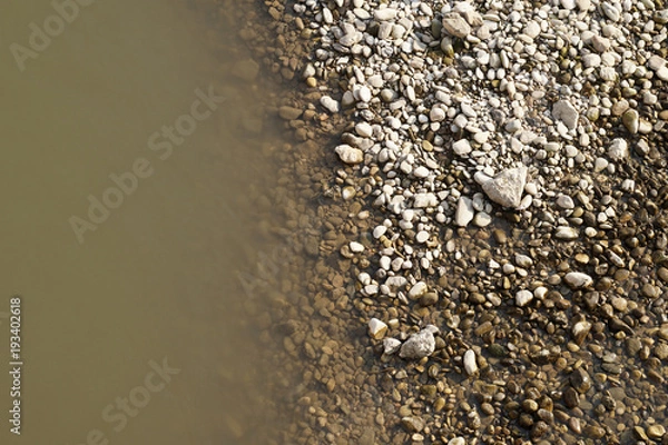 Fototapeta Pebbels in the river