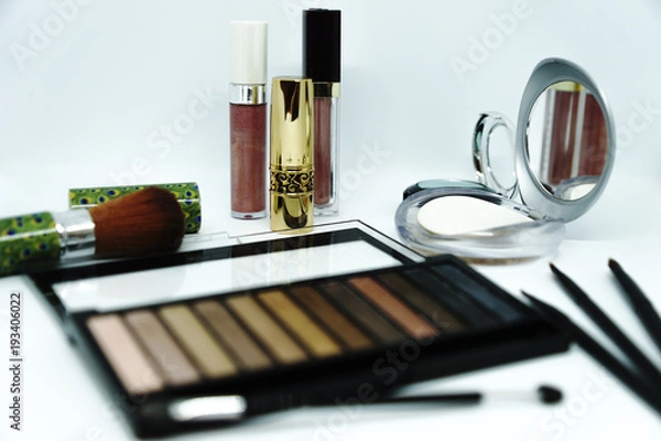 Fototapeta Make up brush and cosmetics isolated on white background.