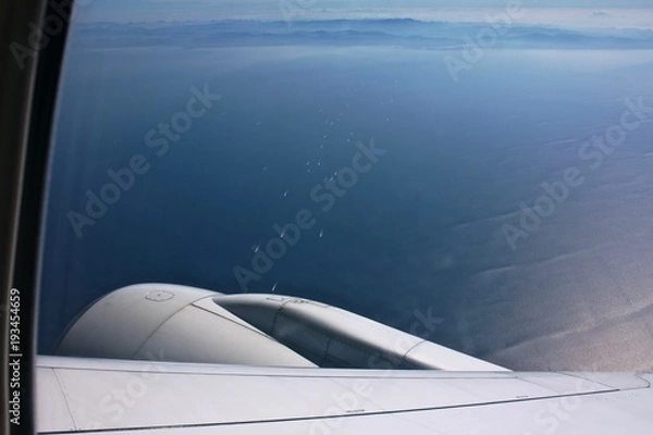 Fototapeta the view from the window of a turist airliner, traffic speed boats, Thailand