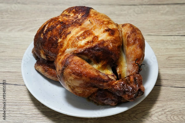 Obraz こんがり焼けた丸鶏のローストチキン