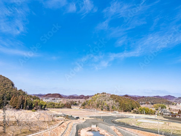 Obraz 果てなく広がる青空。里山を包む春の息吹