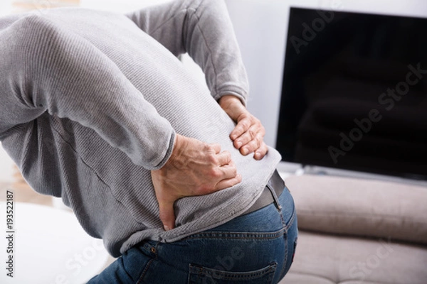 Fototapeta Man Suffering From Back Pain