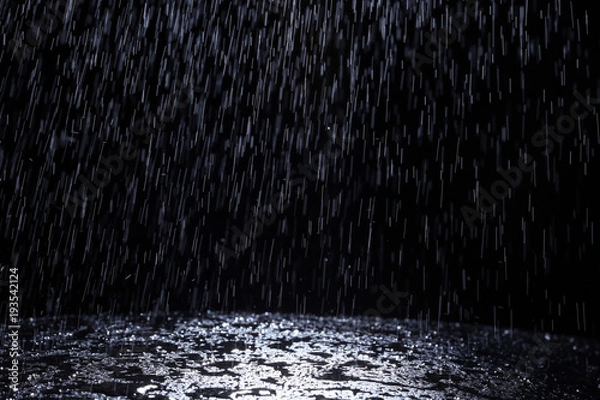 Obraz Dark background shot of rain falling