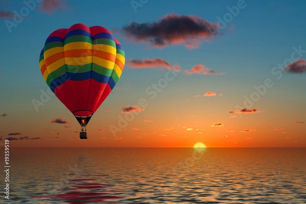 Fototapeta balon lecący na zachód słońca