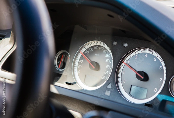 Fototapeta Front panel of car with speedometer and tachometer
