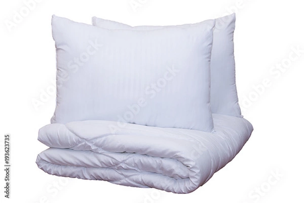 Obraz Roll of soft white blankets and white pillows isolated on white background