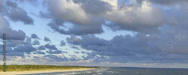 Obraz Wolken über Sandstrand