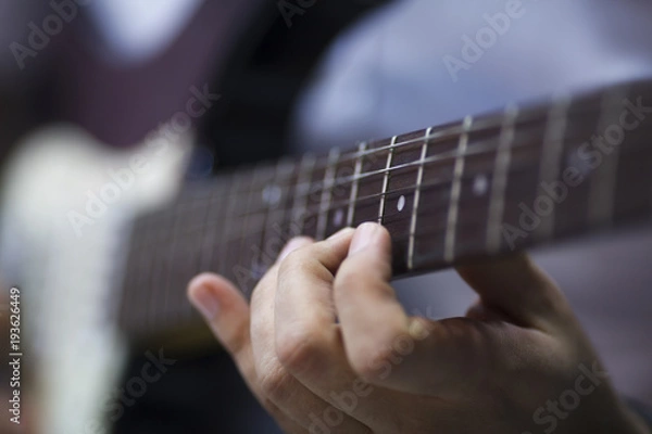 Fototapeta Finger On Guitar