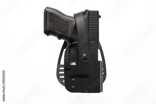 Fototapeta A pistol in a hard case holster