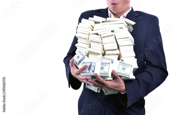 Fototapeta Young businessman With lots of money Based on success in business investment.