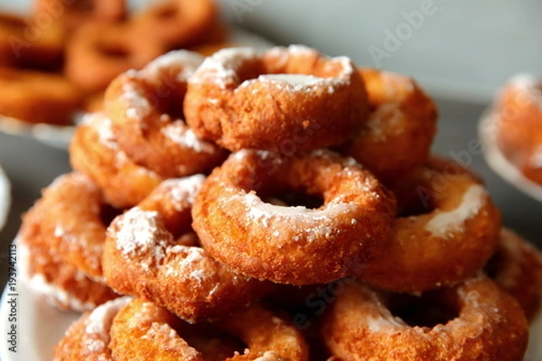 Obraz A homemade donut, despite the non-ideal shape, is a taste superior to any other donut purchased in a store or in a supermarket because it was created from the work of its own hands.
