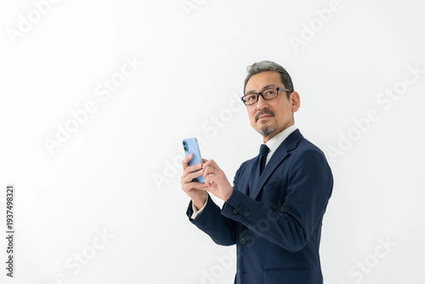Obraz ビジネス　男性　スマートフォン　スマホ