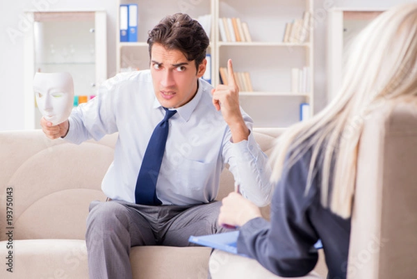Obraz Young man visiting psychiatrist doctor for consultation