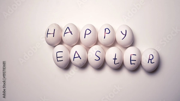 Fototapeta Eggs with the inscription of a happy Easter