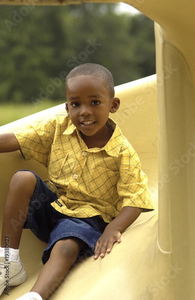 Obraz African American boy on slide