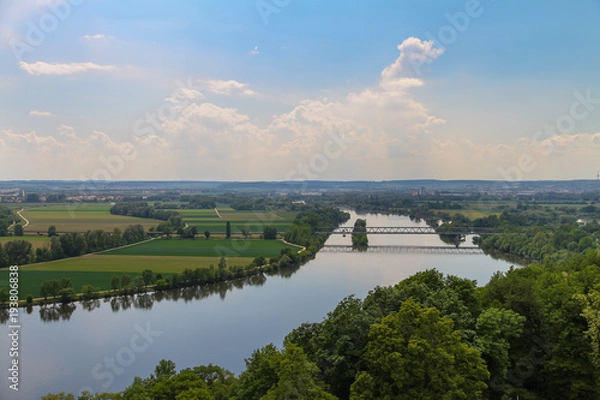 Fototapeta Panoramic view over a wide river in summer