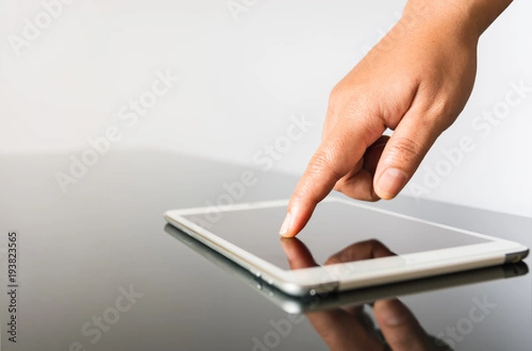 Obraz closeup hand using tablet