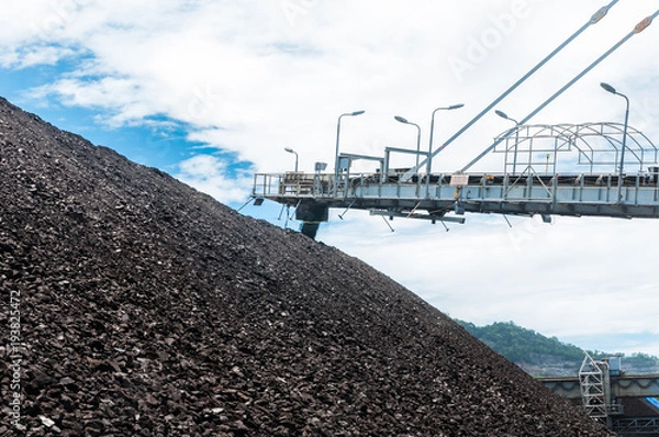 Fototapeta Coal stacker and Coal Reclaimer are mining machinery, or mining equipment in the mining industry that large or huge machine used in bulk material handling in stockpile as the Coal Production