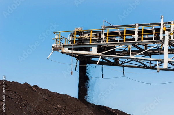 Fototapeta Coal stacker and Coal Reclaimer are mining machinery, or mining equipment in the mining industry that large or huge machine used in bulk material handling in stockpile as the Coal Production