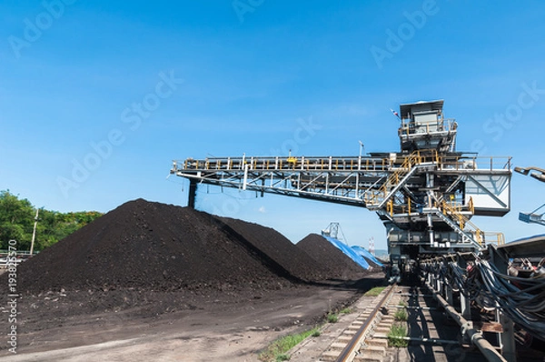 Fototapeta Coal stacker and Coal Reclaimer are mining machinery, or mining equipment in the mining industry that large or huge machine used in bulk material handling in stockpile as the Coal Production