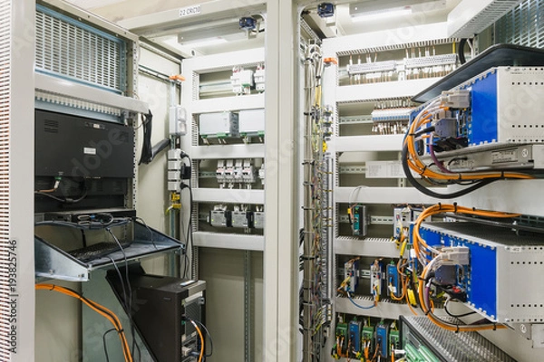 Fototapeta Electrical Panel or equipment Switch of electrical room / switch gear and control room in electricity industry, Power Plant, Substation including the component such as voltage switch, circuit, wire