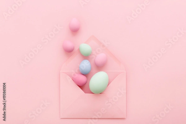 Fototapeta Easter eggs in pink envelope
