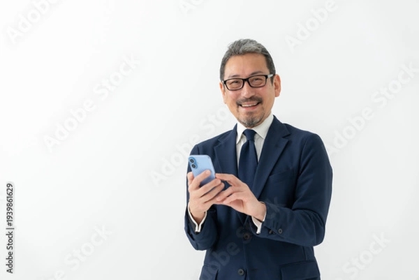 Obraz ビジネス　男性　スマートフォン　スマホ