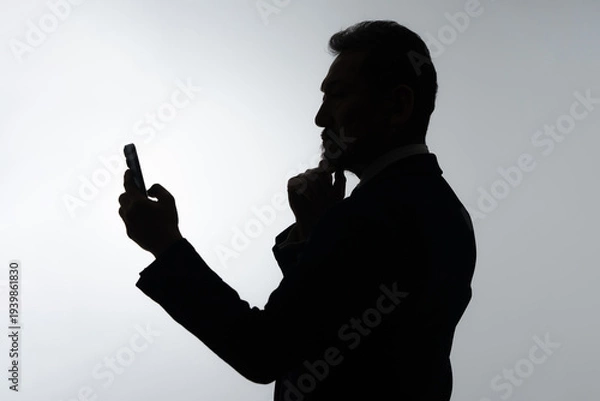 Obraz ビジネス　男性　スマートフォン　スマホ