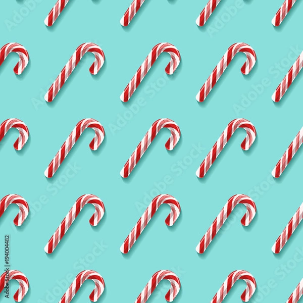 Fototapeta Seamless pattern with candy cane lollypops