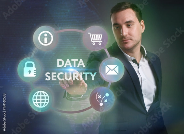 Fototapeta Business, Technology, Internet and network concept. Young businessman working on a virtual screen of the future and sees the inscription: Data security