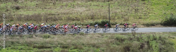Fototapeta aerial image of cycling tour de l'Avenir, showing a helicopter view like on a live tv broadcast