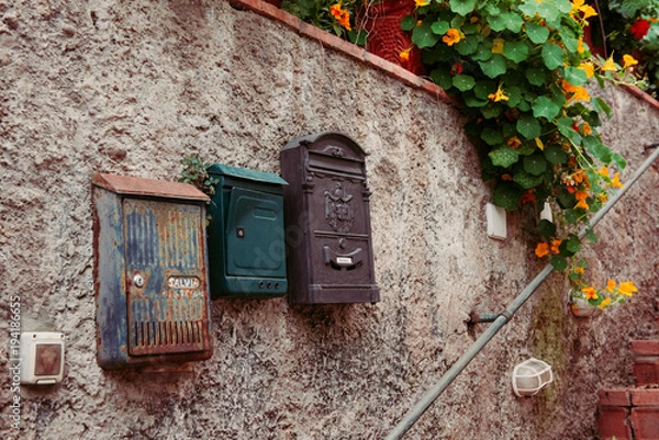 Obraz Vintage iron rusty post boxes on a wall