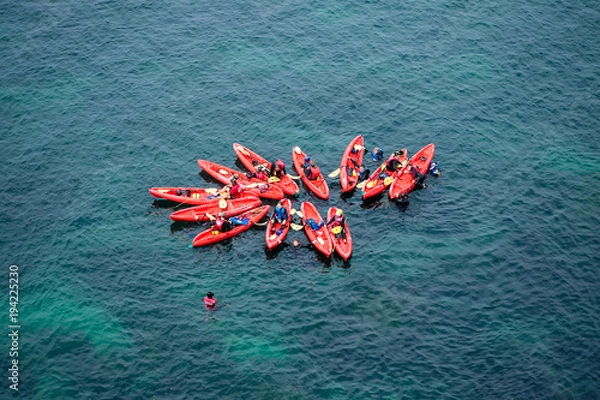 Obraz Group of Kayaks in formation in the ocean