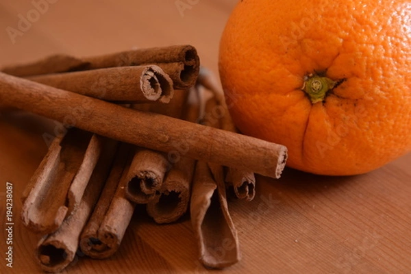 Obraz zimtstangen mit orange