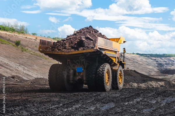 Fototapeta Big dump truck is mining machinery, or mining equipment to transport coal from open-pit or open-cast mine as the Coal Production