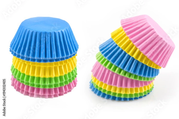 Fototapeta Colorful cupcake, paper cups, muffin cup isolated on white background, Stack of paper cupcakes, muffins on white background.