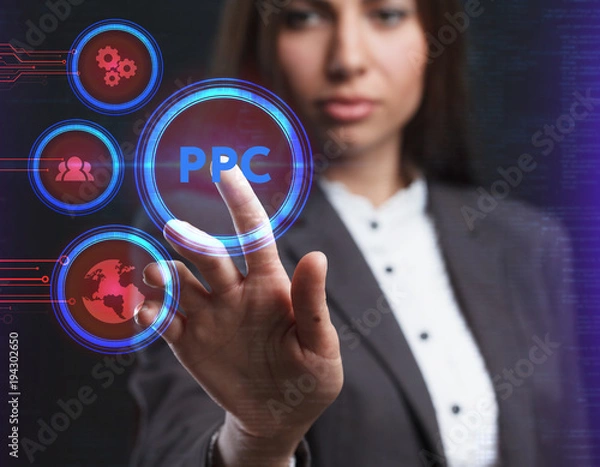 Fototapeta The concept of business, technology, the Internet and the network. A young entrepreneur working on a virtual screen of the future and sees the inscription: PPC