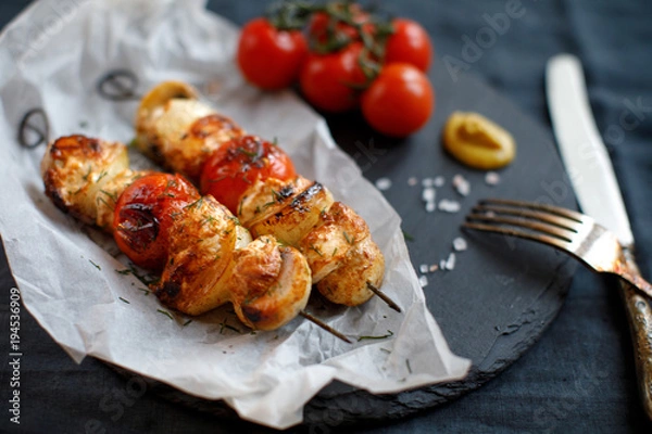 Fototapeta High angle view of grilled skewers meat kebabs with vegetables arranged with  salads