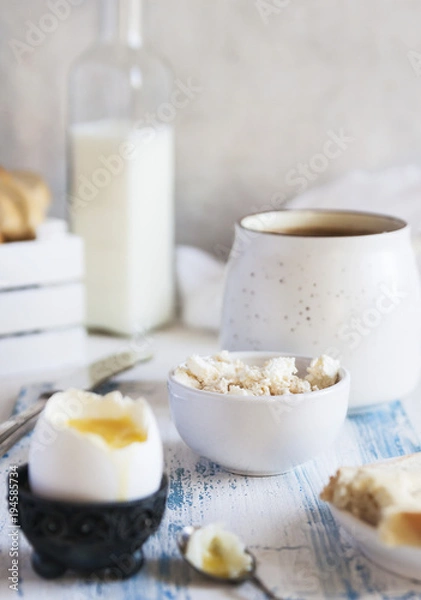 Fototapeta Family breakfast. Recipes eggs boiled. Close up. Selective focus. Vertical.