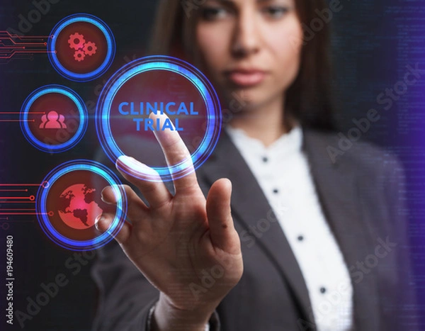 Fototapeta The concept of business, technology, the Internet and the network. A young entrepreneur working on a virtual screen of the future and sees the inscription: Clinical trial