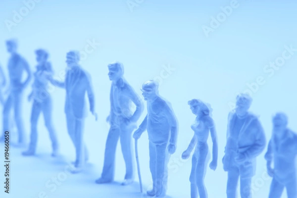 Fototapeta 一列に並んだミニチュア人形
