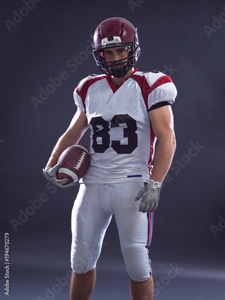 Fototapeta American Football Player isolated on gray