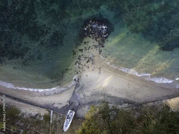 Fototapeta Drone view of a crystal clear beach