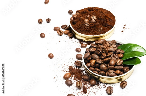 Obraz Shiny fresh roasted coffee beans with leaves isolated on white background