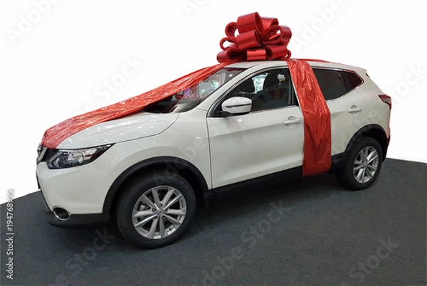 Obraz Machine with a red bow isolated on white background. Gift