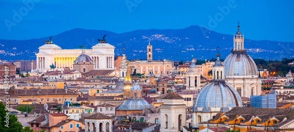 Fototapeta View of Rome from Castel Sant'Angelo at blue hour. Rome cityscape.