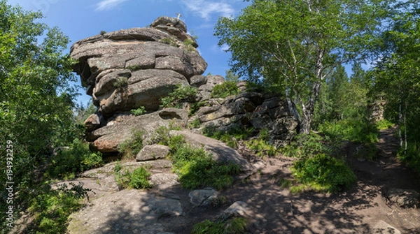 Fototapeta Cross at the top of cliff on Mount Tserkovka resort Belokurikha in the Altai Krai