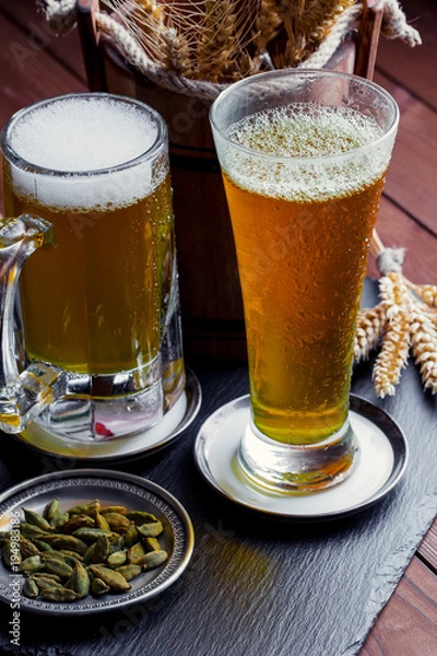 Fototapeta Light beer on an old background