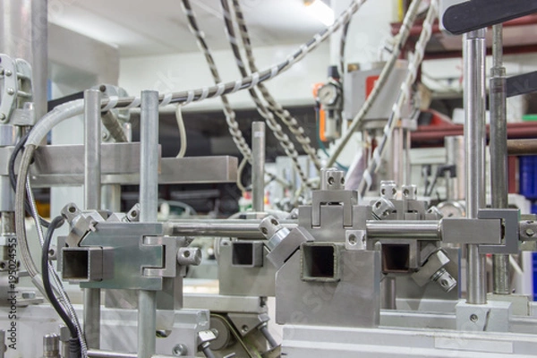 Fototapeta Industrial robot working in factory,Industry 4.0 Robot concept .