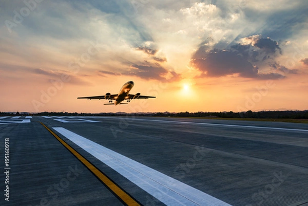 Fototapeta passenger plane fly up over take-off runway from airport